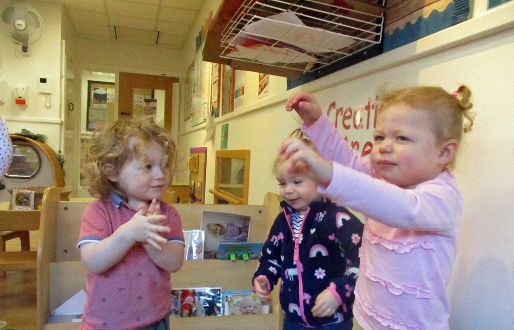 Toddlers take part in a Boogie Mites session at nursery
