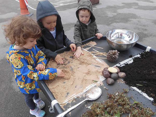 Derbyshire nursery children explore objects from natural environment