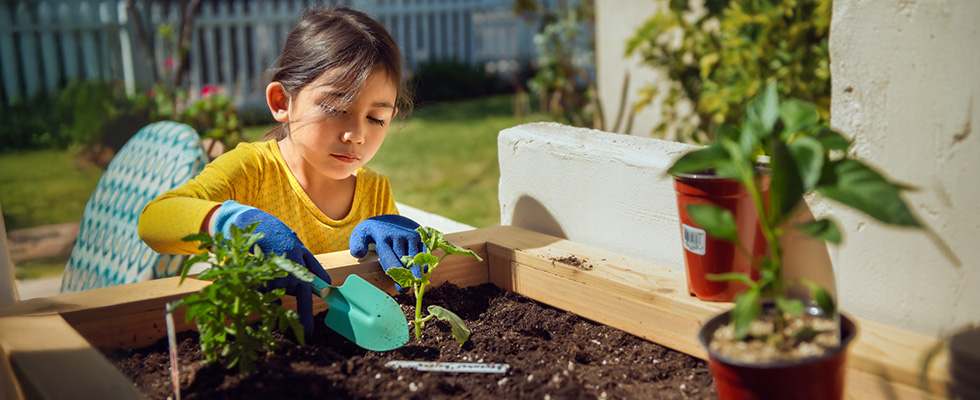 Child gardening at home 