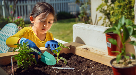 Child gardening at home 