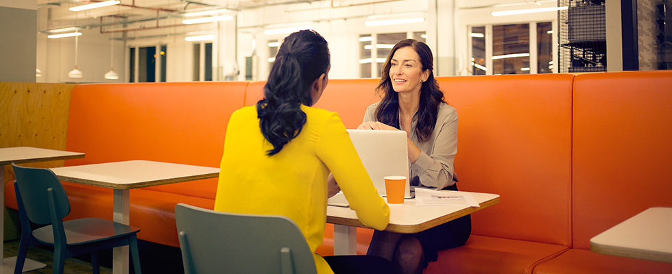 Manager Boost Morale with team member in the New Year