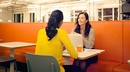 Manager Boost Morale with team member in the New Year